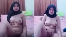 Viral 4_BG Jilbab Hitam Remas Toket Video by PornOne